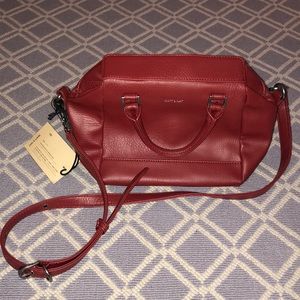 red vegan leather handbag